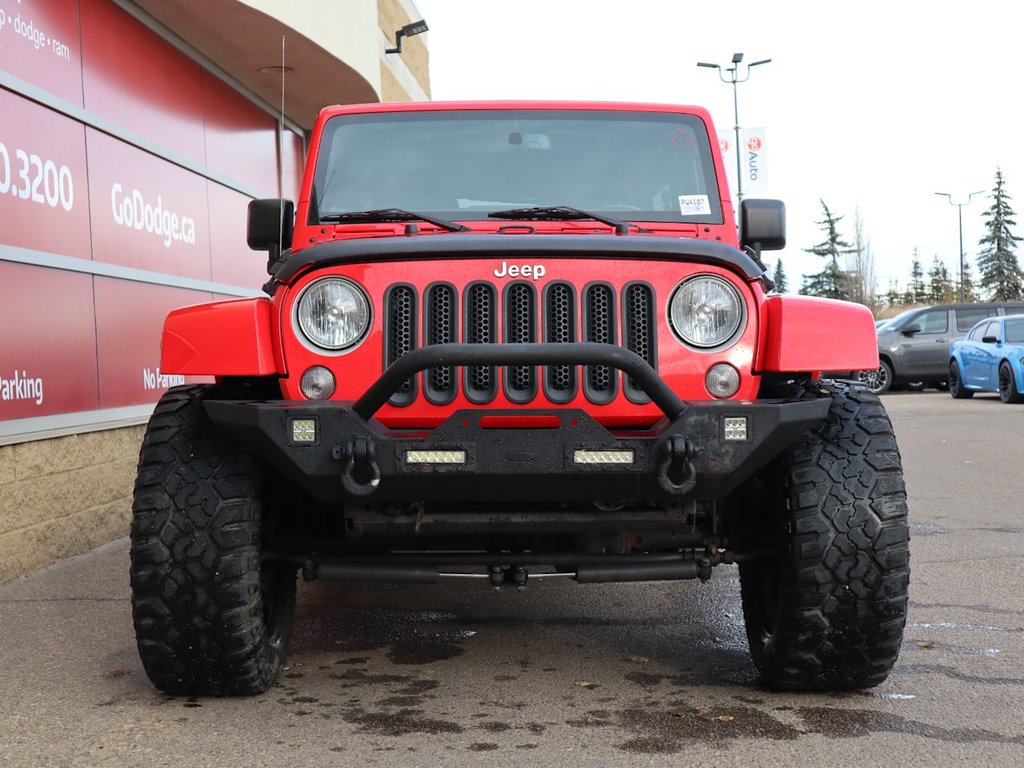 2018 Jeep WRANGLER JK UNLIMITED UNLIMITED SAHARA IN FIRECRACKER RED EQUIPPED WITH A 3.6L V6 , 4X4 , 5SPD AUTO , REMOTE START , AC , HEATED FRONT SEATS , NAV , C-1