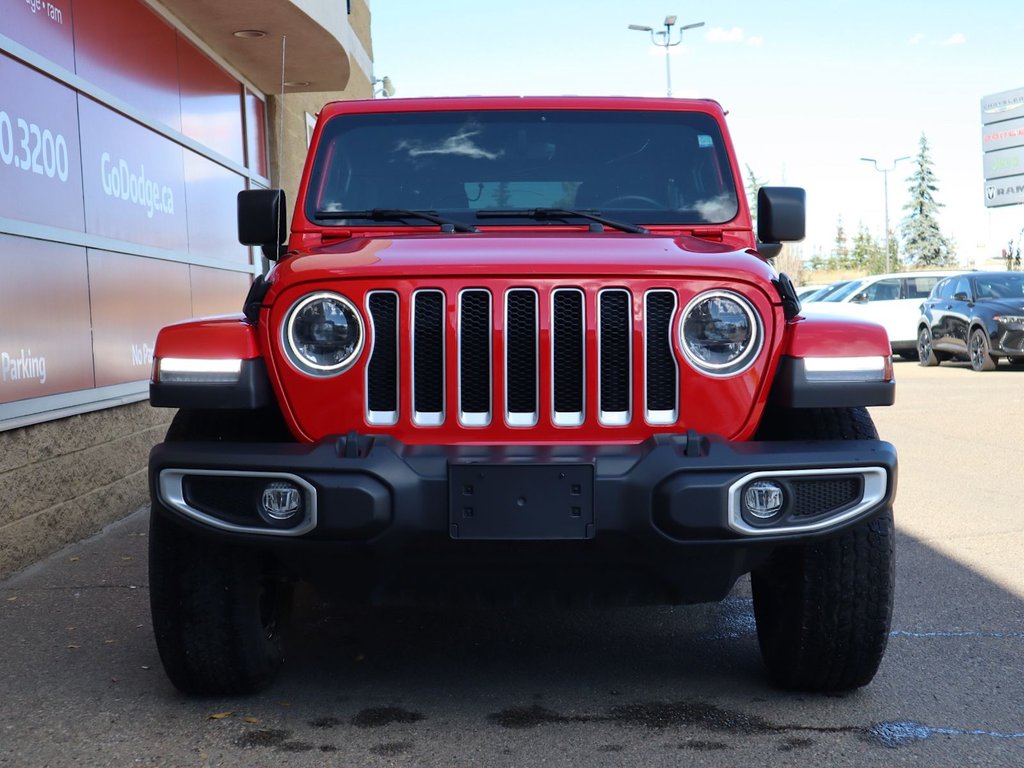 2023 Jeep Wrangler SAHARA IN FIRECRACKER RED EQUIPPED WITH A 3.6L V6 W/ETORQUE , 4X4 , 8SPD TF AUTO , HARDTOP , SIDE STEPS , LSD , LED LIGHTING , T-1