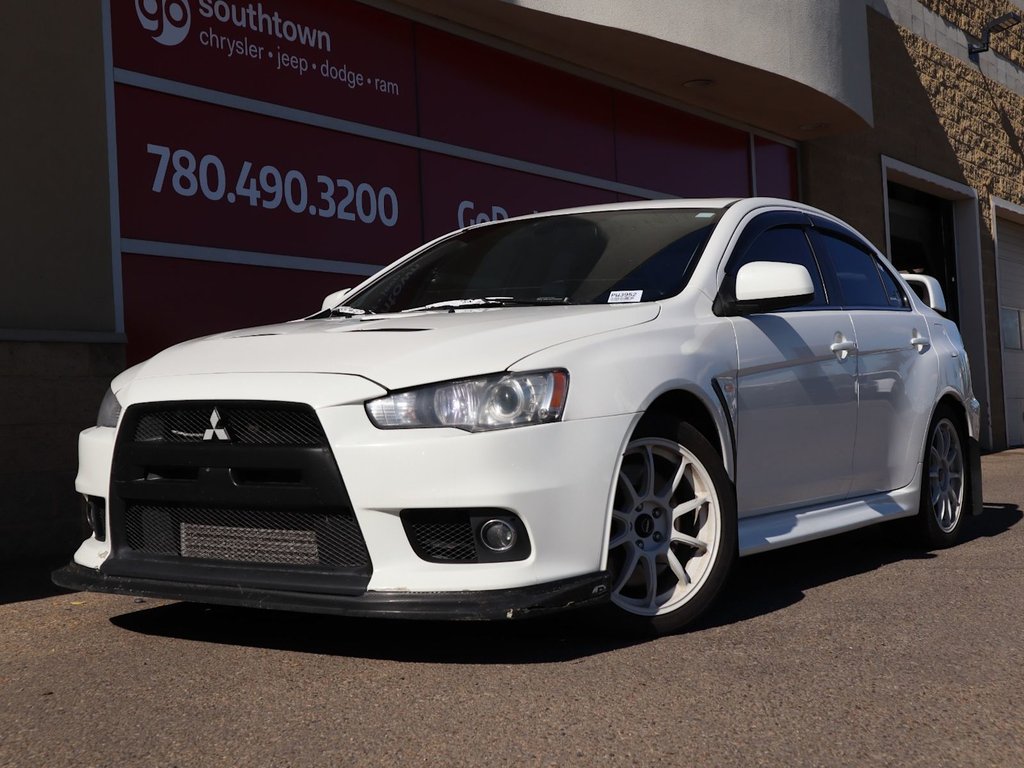 2014 Mitsubishi Lancer Evolution EVO MR IN WHITE EQUIPPED WITH A 2.0L TURBO I4 , AWD , 6SPD AUTO , PADDLE SHIFTERS , LEATHER HEATED SEATS , AC , CRUISE , PREMIUM-0