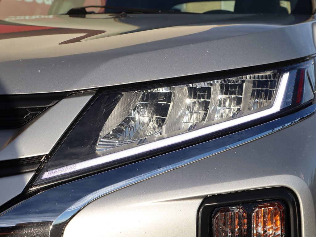 2021 Mitsubishi RVR ES IN SILVER EQUIPPED WITH A 2.0L I4 , 4WD , CVT AUTO , CLOTH HEATED SEATS , BACKUP CAM , AC , CRUISE , 4 SPEAKER AUDIO , TIPTRO-3