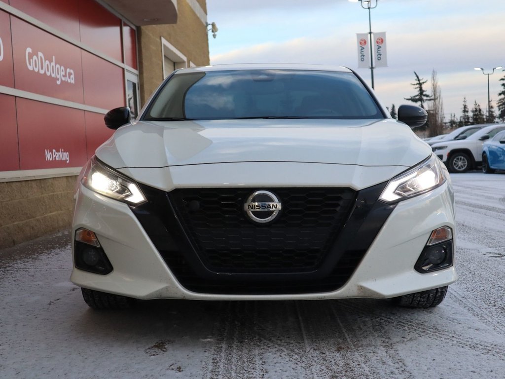 2022 Nissan Altima SR MIDNIGHT EDITION IN WHITE EQUIPPED WITH A 2.5L I4 , AWD , CVT AUTO , BLACK RIMS , PWR SUNROOF , DUAL EXHAUST , LEATHER HEATED-1
