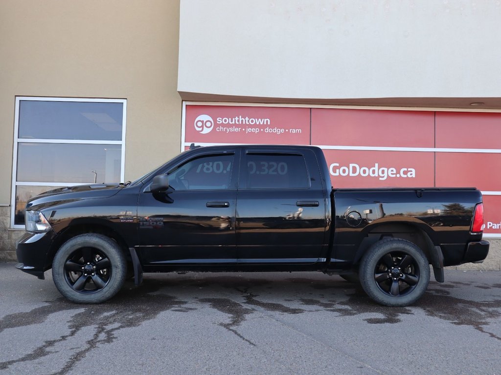 2021 Ram 1500 Classic CLASSIC EXPRESS IN DIAMOND BLACK EQUIPPED WITH A 5.7L HEMI V8 , 4X4 , 8SPD TF AUTO , SPORT HOOD , WHEEL & SOUND GROUP , BLACK AC-6