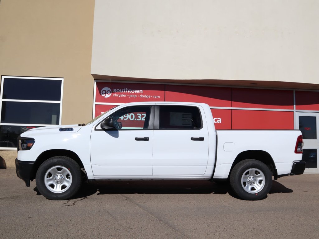 2023 Ram 1500 TRADESMAN IN BRIGHT WHITE EQUIPPED WITH A 5.7LHEMI V8 W/ETORQUE , 4X4 , 8SPD AUTO , CLASS IV HITCH RECEIVER , ANTI SPIN DIFF , 3-6
