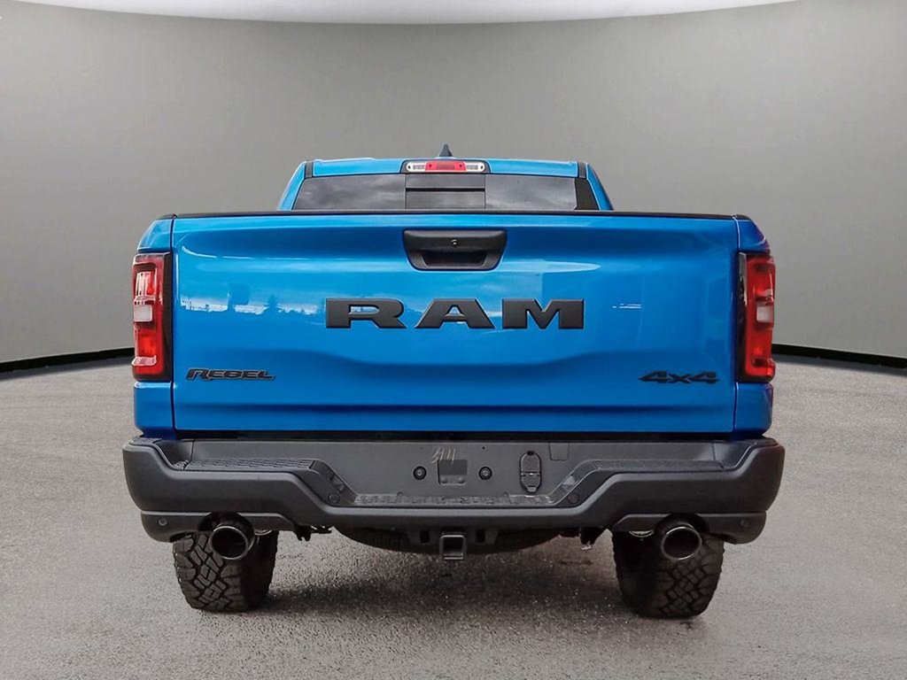 2025 Ram 1500 REBEL IN HYDRO BLUE EQUIPPED WITH A 3.0L TWIN TURBO I6 , 4X4 , 8SPD AUTO , PERF SHOCKS , CLOTH/VINYL BUCKET SEATS-4