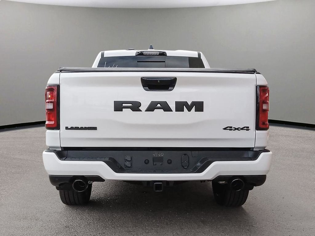 2025 Ram 1500 LARAMIE IN BRIGHT WHITE EUQIPPED WITH A 3.0L TWIN TUBRO I6 , 4X4 , 8SPD AUTO , HANDS FREE DRIVING ASSIST , AIR SUSPENSION , 125L-4
