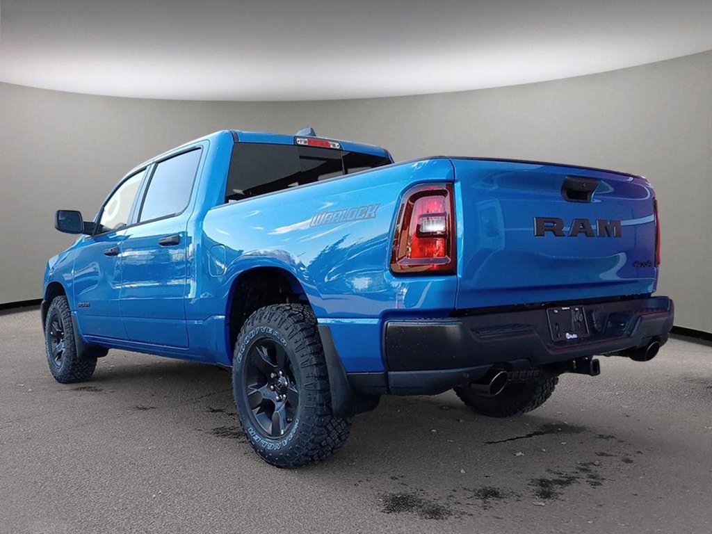 2025 Ram 1500 WARLOCK IN HYDRO BLUE EQUIPPED WITH A 3.0L TWIN TUBRO HURRICANE I6 , 4X4 , 8SPD AUTO , E LOCKER REAR AXLE , BACKUP CAM , PERF SH-3
