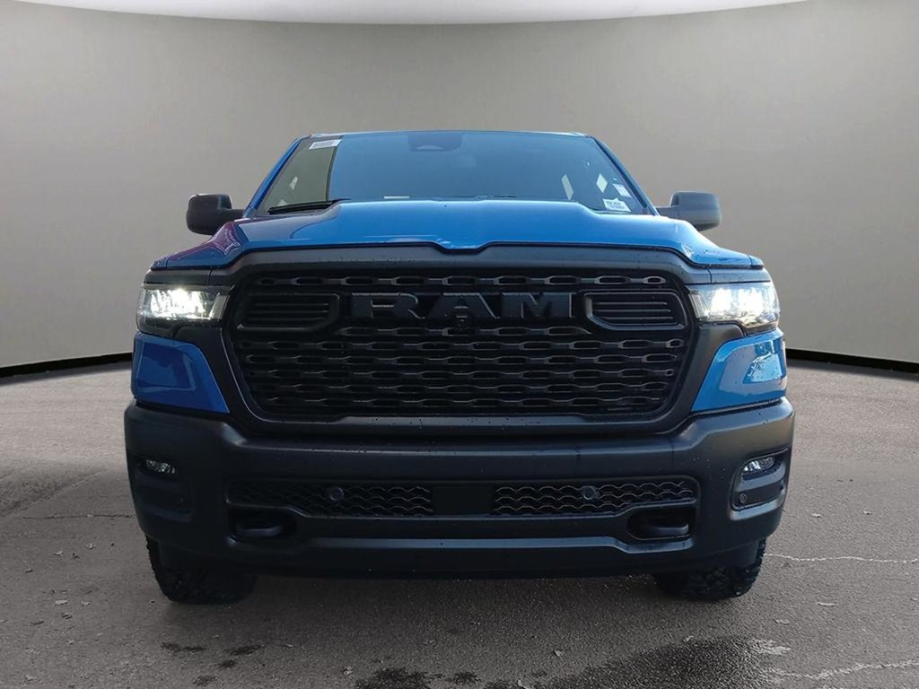 2025 Ram 1500 WARLOCK IN HYDRO BLUE EQUIPPED WITH A 3.0L TWIN TUBRO HURRICANE I6 , 4X4 , 8SPD AUTO , E LOCKER REAR AXLE , BACKUP CAM , PERF SH-1