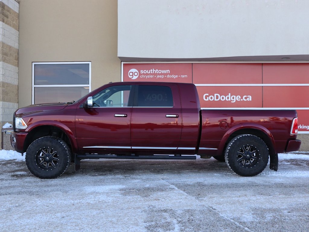 2017 Ram 2500 LIMITED MEGA CAB IN RED PEARL EQUIPPED WITH A 6.7L CUMMINS TURBO DIESEL I6 , 4X4 , 6SPD AUTO , REAR AUTO LVL AIR SUSPENSION , SU-6