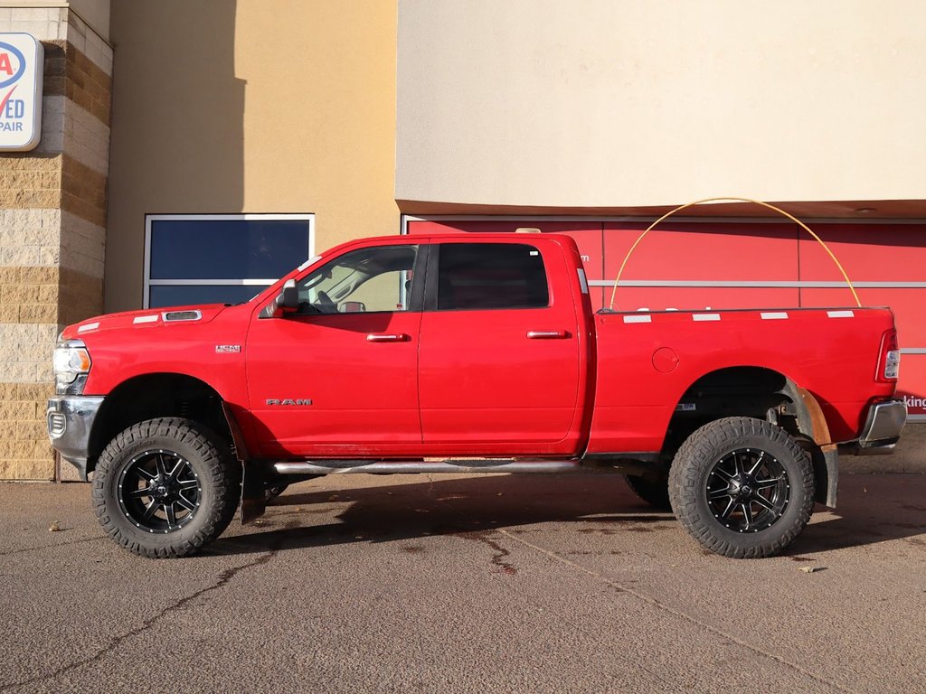 2019 Ram 2500 CREW CAB IN FLAME RED EQUIPPED WITH A 6.4L HEMI V8 , 4X4 , 8SPD AUTO , PROTECTION GROUP , 18INCH RIMS , 6SPEAKER AUDIO , AC-6