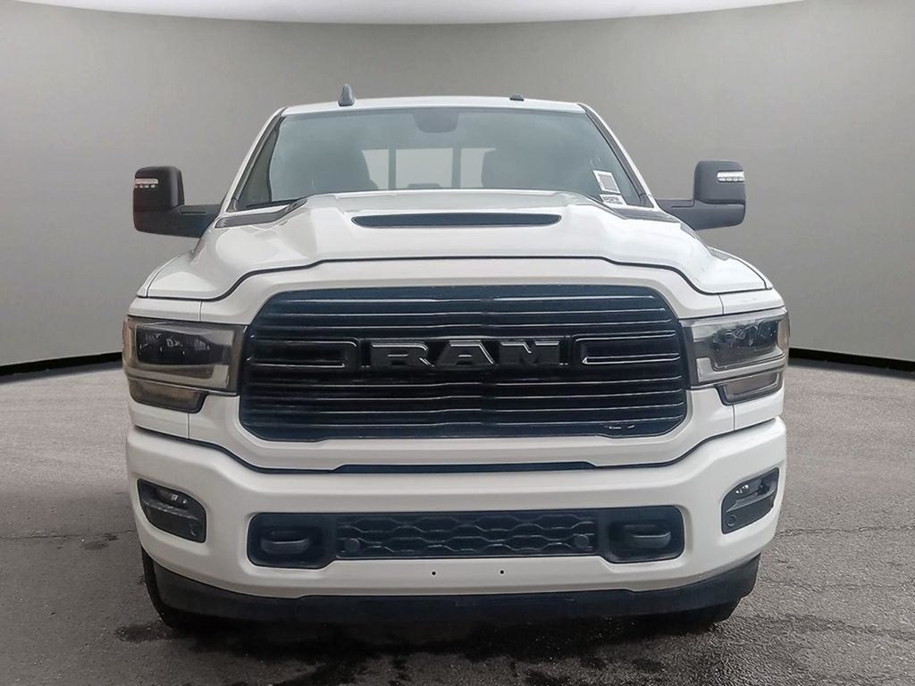 2024 Ram 2500 LARAMIE NIGHT EDITION IN BRIGHT WHITE EQUIPPED WITH A 6.7L CUMMINS TURBO DIESEL I6 , 4X4 , 6SPD AUTO , SUNROOF , LARAIE LEVEL B-1