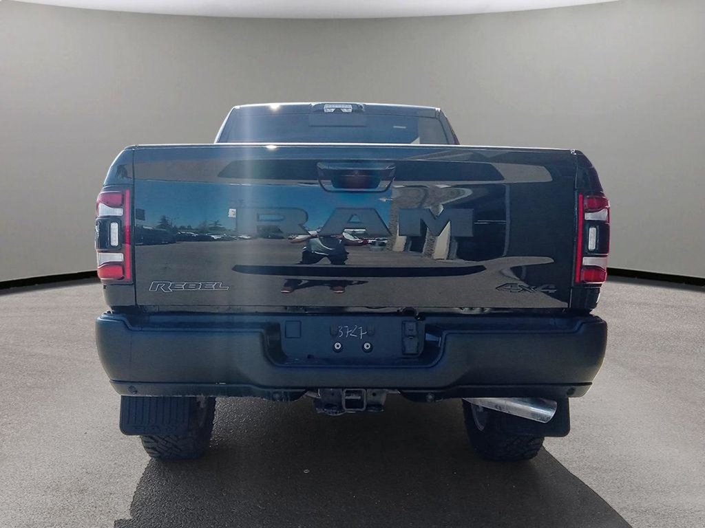 2024 Ram 2500 REBEL IN DIAMOND BLACK EQUIPPED WITH A 6.7L CUMMINS TURBO DIESEL , 6SPD AUTO , 4X4 , TOWING TECH GROUP , LVL 1 EQUIPMENT , 20INC-4