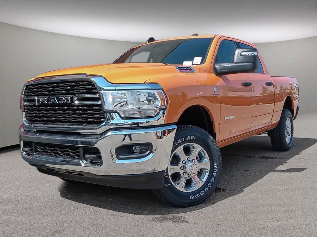2024 Ram 2500 BIG HORN IN OMAHA ORANGE EQUIPPED WITH A 6.7L CUMMINS TURBO DIESEL I6 , 4X4 , 6SPD AUTO , 12INCH W/NAV , REMOTE START , ALPINE A-0