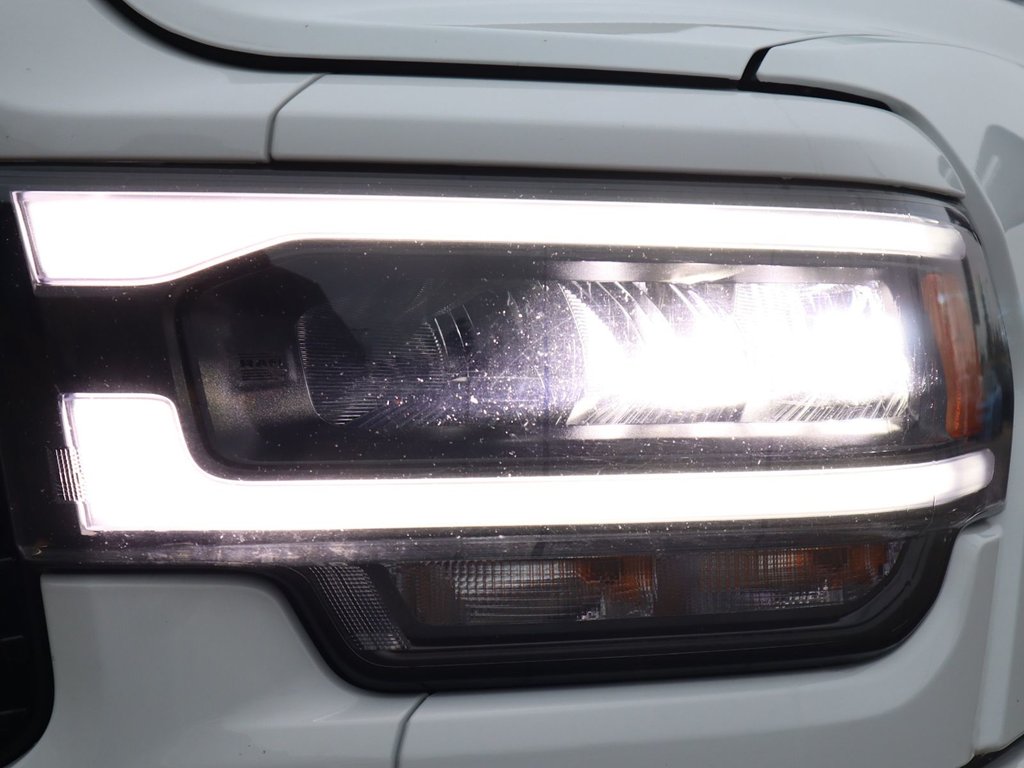 2023 Ram 3500 LARAMIE IN BRIGHT WHITE EQUIPPED WITH A 6.7L CUMMINS TURBO DIESEL I6 , 4X4 , 6SPD AUTO , REAR AUTO LVL AIR SUSPENSION , LARAMIE-3