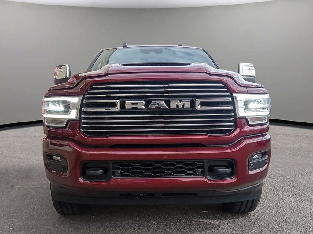 2024 Ram 3500 LARAMIE IN RED PEARL EQUIPPED WITH A 6.7L CUMMINS TURBO DIESEL I6 , 4X4 , 6SPD AUTO , SUNROOF , REAR AUTO LEVELLING AIR SUSPENSI-1