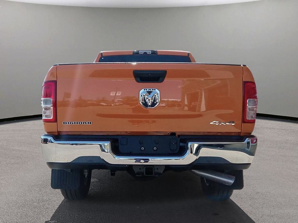 2024 Ram 3500 BIG HORN IN OMAHA ORANGE EQUIPPED WITH A 6.7L CUMMINS HO TURBO DIESEL I6 , 4X4 , 6SPD AISIN HD AUTO , 12INCH W/NAV , ALPINE AUDI-4