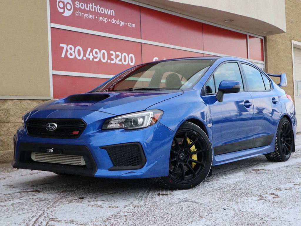 2019 Subaru WRX STI IN BLUE EQUIPPED WITH A 2.5L TURBO H4 , AWD , 6SPD MANUAL , RECARO BUCKET SEATS , SPOILER , QUATTRO EXHAUST , HOOD SCOOP , A-0