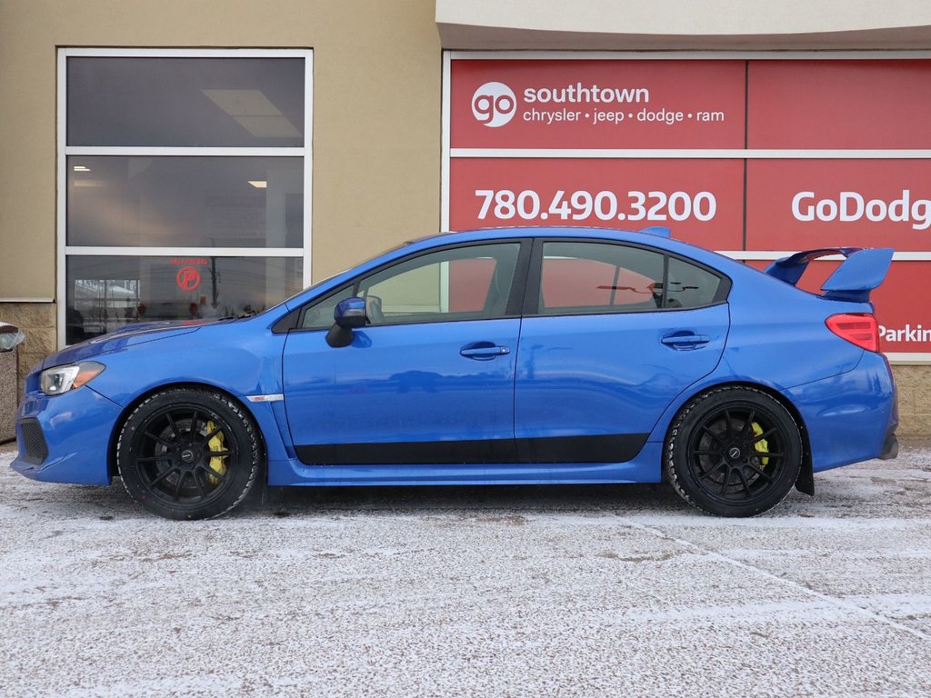 2019 Subaru WRX STI IN BLUE EQUIPPED WITH A 2.5L TURBO H4 , AWD , 6SPD MANUAL , RECARO BUCKET SEATS , SPOILER , QUATTRO EXHAUST , HOOD SCOOP , A-7