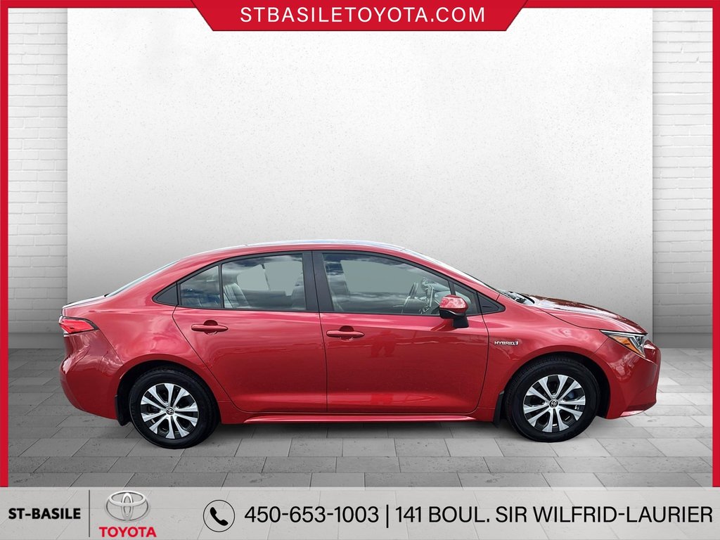 Toyota COROLLA HYBRIDE LE PREMIUM INTERIEUR CUIR VOLANT SIEGES CHAUFFANT 2020 à Saint-Basile-Le-Grand, Québec - 4 - w1024h768px