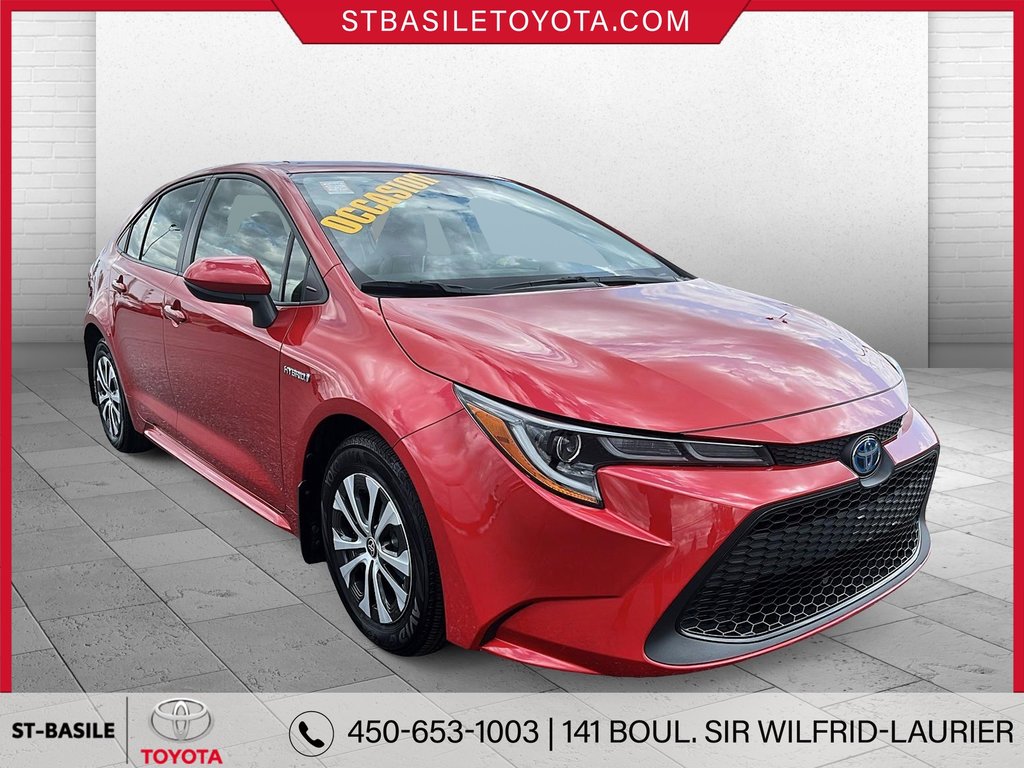 Toyota COROLLA HYBRIDE LE PREMIUM INTERIEUR CUIR VOLANT SIEGES CHAUFFANT 2020 à Saint-Basile-Le-Grand, Québec - 3 - w1024h768px