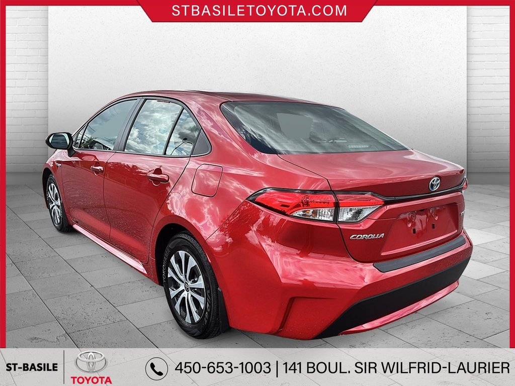 Toyota COROLLA HYBRIDE LE PREMIUM INTERIEUR CUIR VOLANT SIEGES CHAUFFANT 2020 à Saint-Basile-Le-Grand, Québec - 9 - w1024h768px