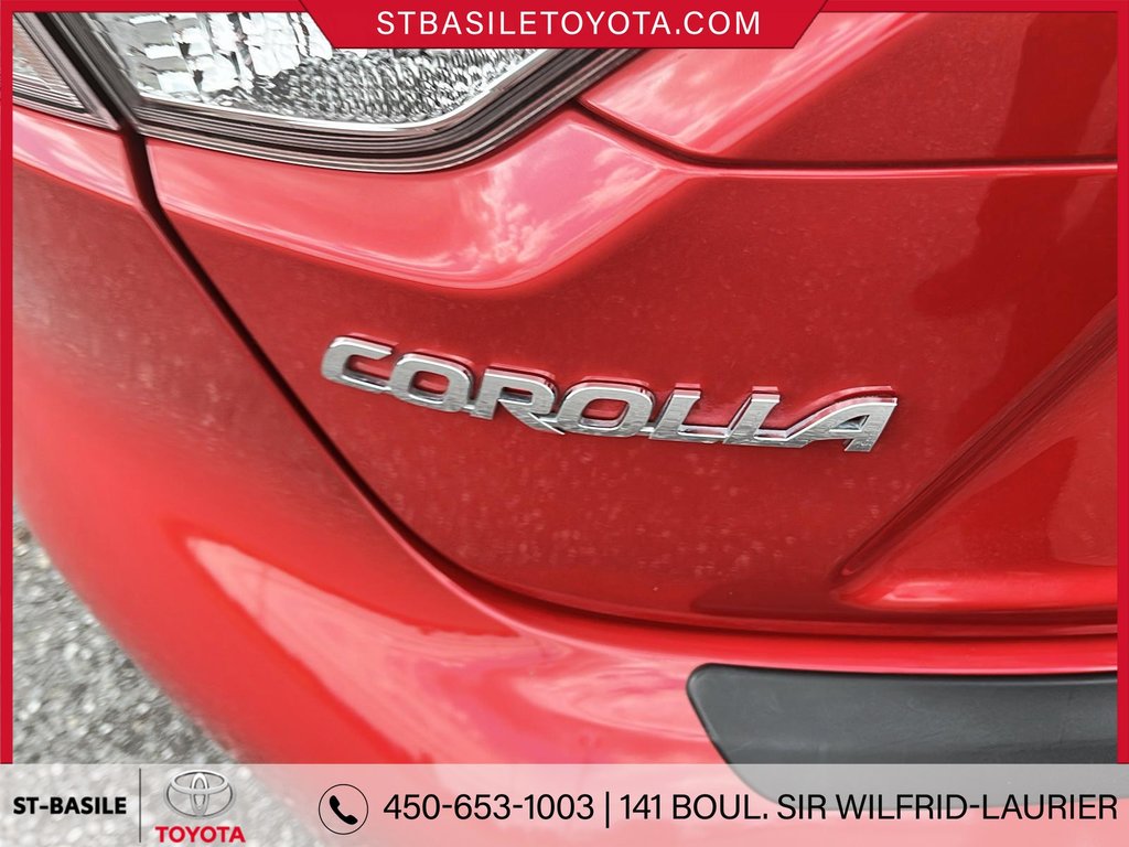 Toyota COROLLA HYBRIDE LE PREMIUM INTERIEUR CUIR VOLANT SIEGES CHAUFFANT 2020 à Saint-Basile-Le-Grand, Québec - 7 - w1024h768px