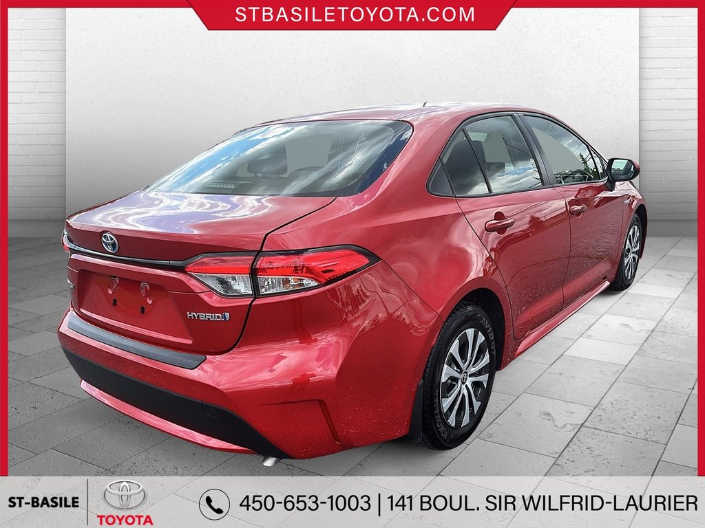 Toyota COROLLA HYBRIDE LE PREMIUM INTERIEUR CUIR VOLANT SIEGES CHAUFFANT 2020 à Saint-Basile-Le-Grand, Québec - 5 - w1024h768px