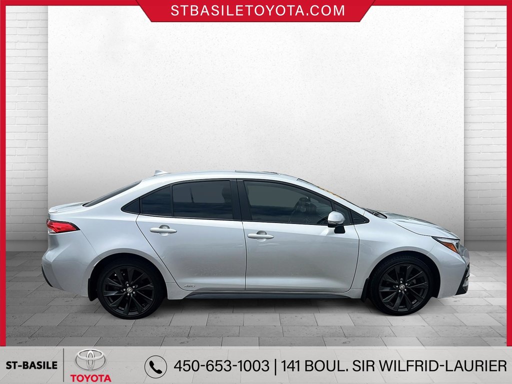 Toyota COROLLA HYBRIDE SE AWD TOIT OUVRANT SIÈGES/VOLANT CHAUFFANT 2023 à Saint-Basile-Le-Grand, Québec - 3 - w1024h768px
