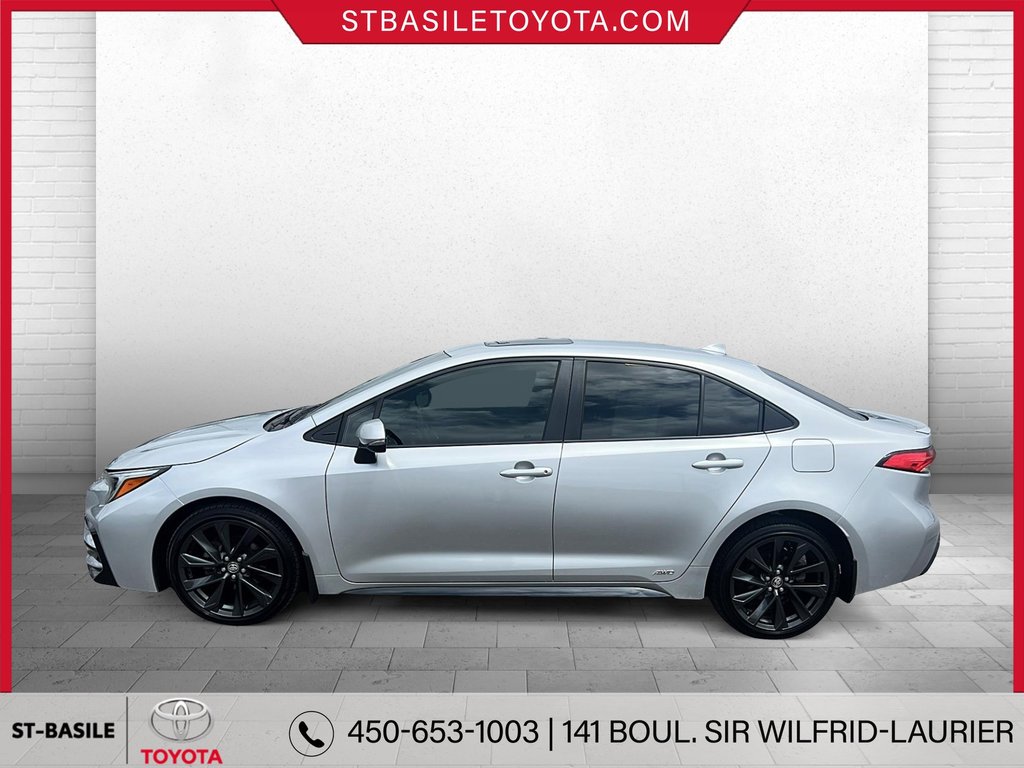 Toyota COROLLA HYBRIDE SE AWD TOIT OUVRANT SIÈGES/VOLANT CHAUFFANT 2023 à Saint-Basile-Le-Grand, Québec - 8 - w1024h768px