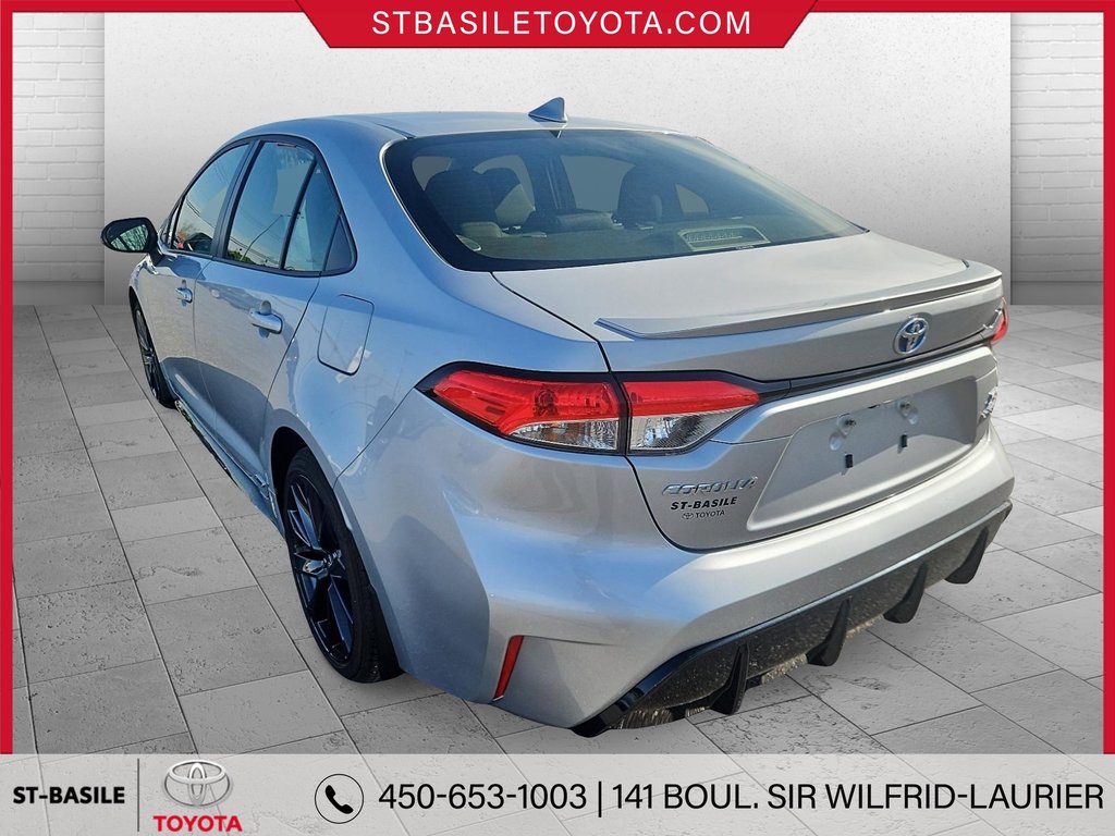 Toyota COROLLA HYBRIDE SE AWD VOLANT/SIEGES CHAUFFANTS CARPLAY 2023 à Saint-Basile-Le-Grand, Québec - 9 - w1024h768px