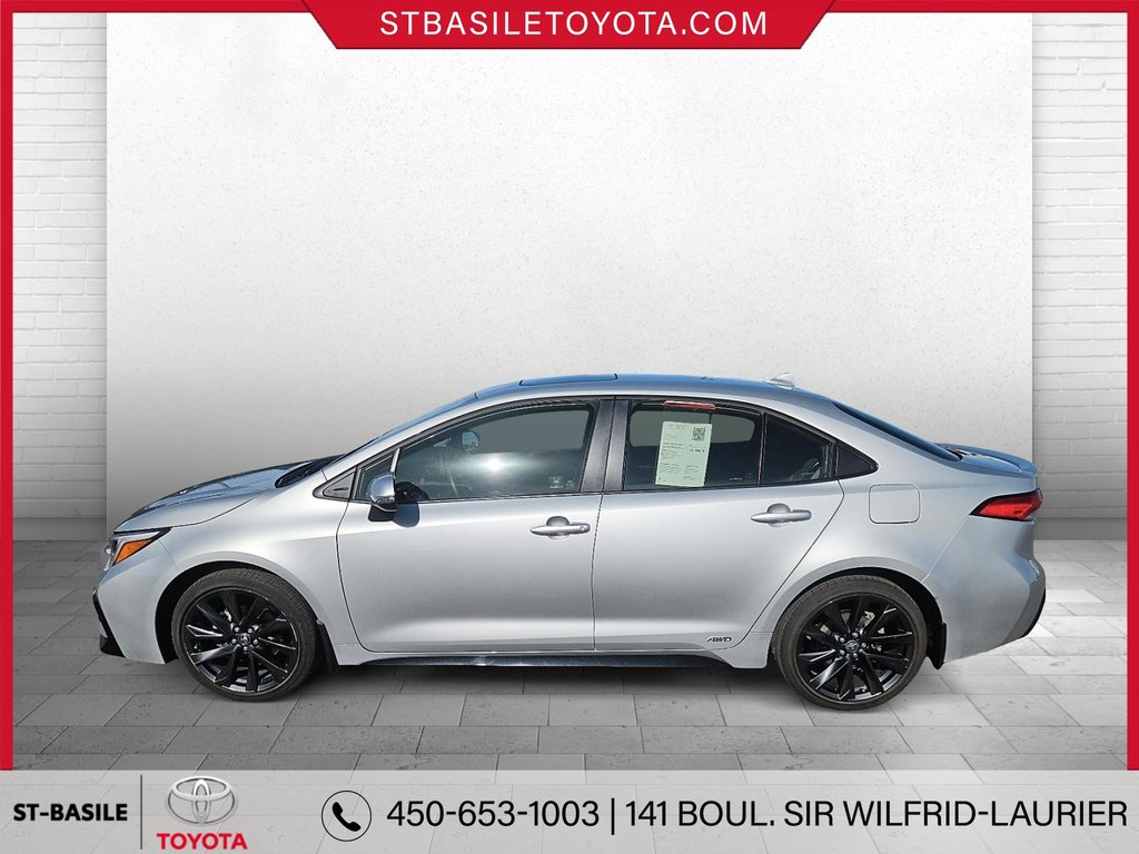 Toyota COROLLA HYBRIDE SE AWD VOLANT/SIEGES CHAUFFANTS CARPLAY 2023 à Saint-Basile-Le-Grand, Québec - 10 - w1024h768px