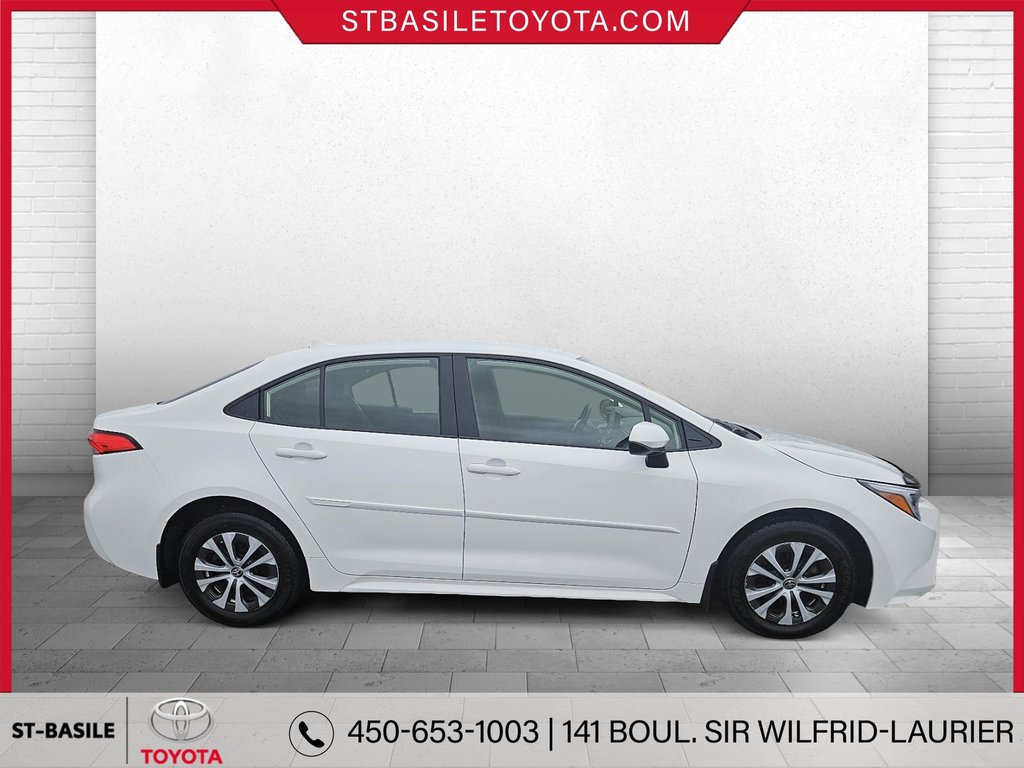 Toyota COROLLA HYBRIDE LE SIÈGES/VOLANT CHAUFFANT BLUETOOTH MAGS 2023 à Saint-Basile-Le-Grand, Québec - 4 - w1024h768px