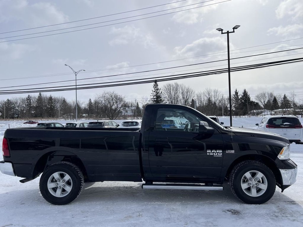 Ram 1500 Classic SLT cabine simple 4x4 caisse de 8 pi 2023 à Saint-Basile-le-Grand, Québec - 4 - w1024h768px