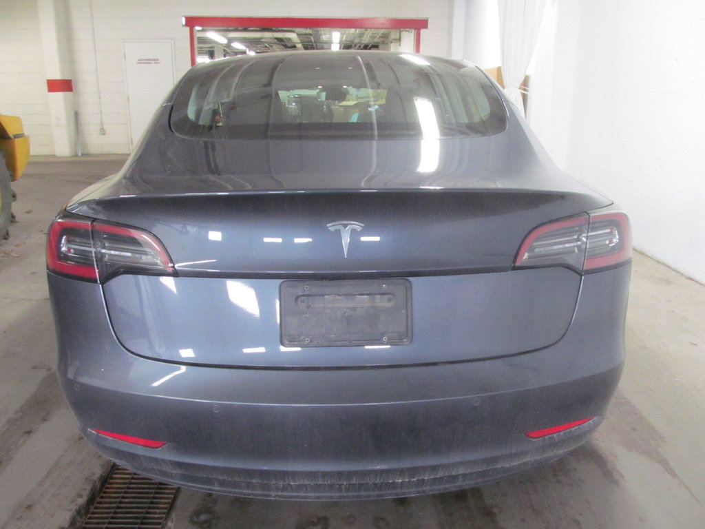 2021 Tesla MODEL 3 Standard Range Plus in Dartmouth, Nova Scotia - 3 - w1024h768px