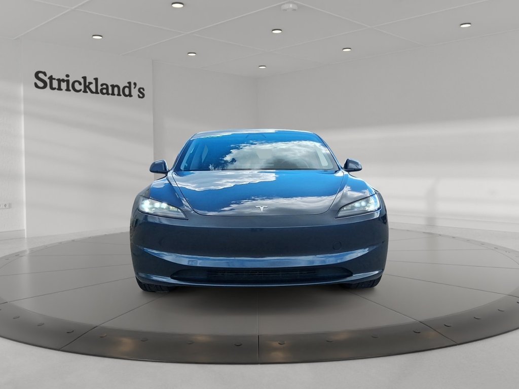 2024 Tesla Model 3 Standard Range RWD in Stratford, Ontario - 2 - w1024h768px