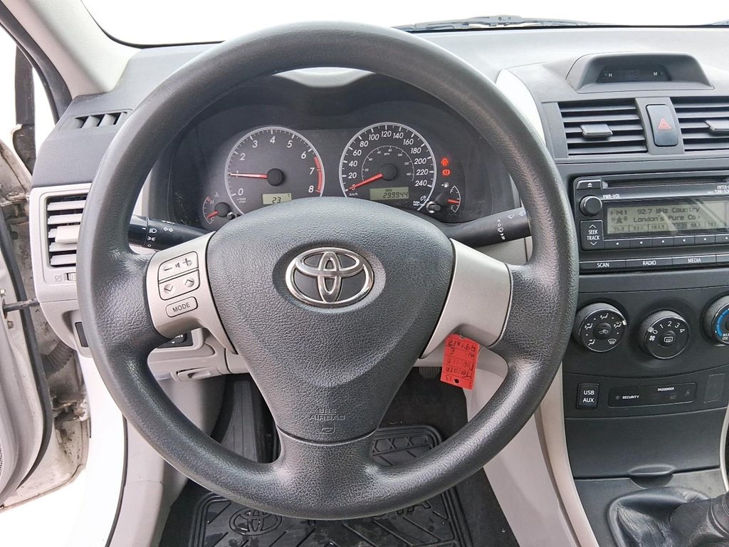 2013 Toyota Corolla 4-door Sedan CE 4A in Stratford, Ontario - 12 - w1024h768px