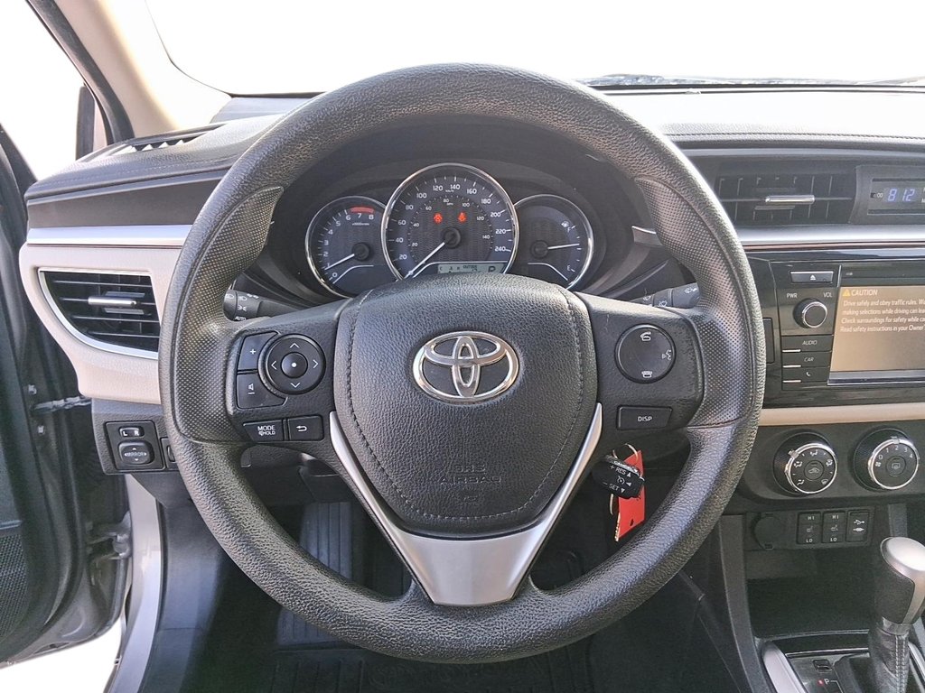 2014 Toyota Corolla 4-door Sedan CE 4A in Stratford, Ontario - 12 - w1024h768px