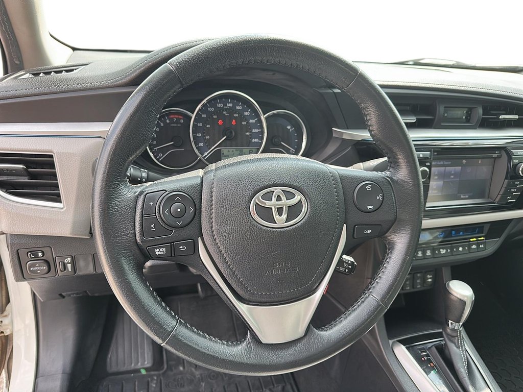 2015 Toyota Corolla 4-door Sedan CE 4A in Stratford, Ontario - 10 - w1024h768px