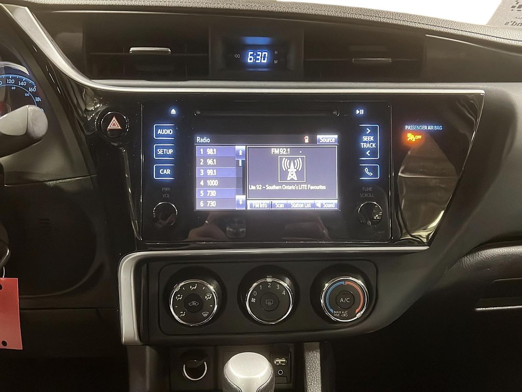 2019  Corolla 4-door Sedan CE CVTi-S in Stratford, Ontario - 11 - w1024h768px