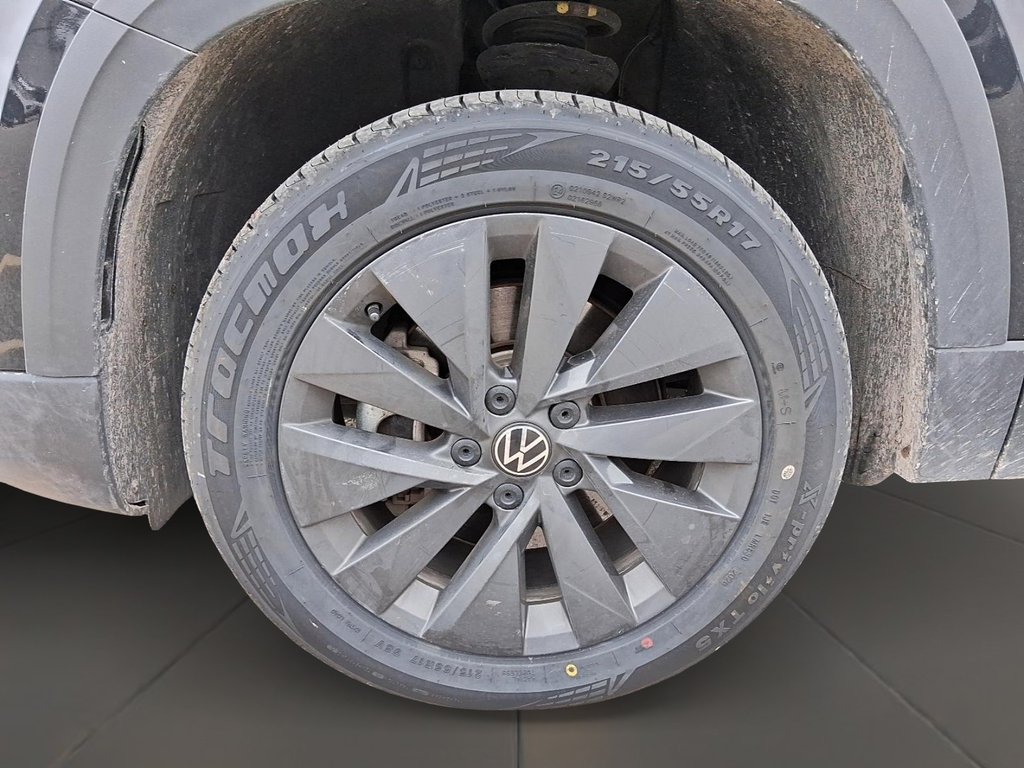 2024 Volkswagen Taos Trendline 1.5T 8sp at w/ Tip in Stratford, Ontario - 7 - w1024h768px