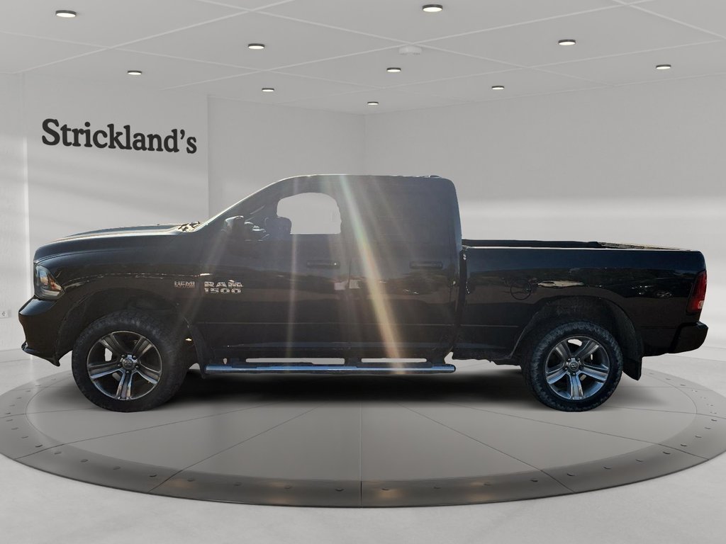 2014 Ram RAM 1500 Quad Cab 4x4 Sport (140.5 WB 6 4 Box) in Stratford, Ontario - 5 - w1024h768px