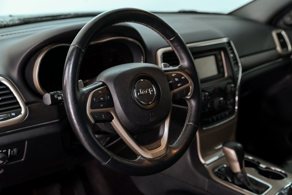 2016 Jeep Grand Cherokee Limited in Brossard, Quebec - 12 - w1024h768px