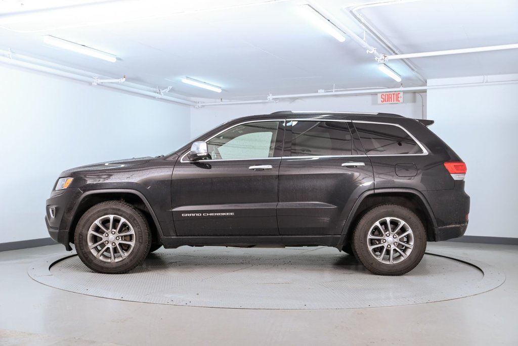 2016 Jeep Grand Cherokee Limited in Brossard, Quebec - 4 - w1024h768px