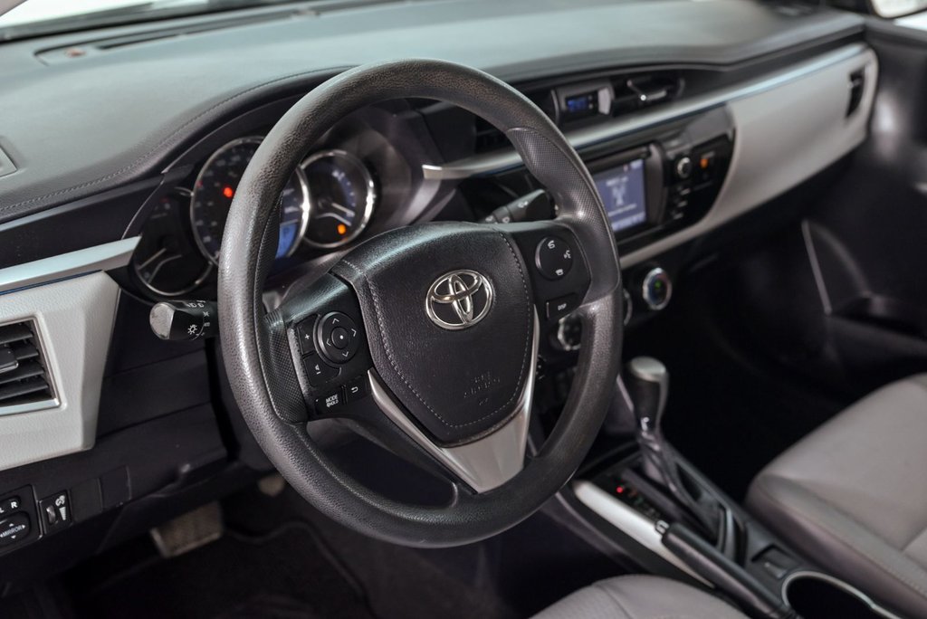 2014 Toyota Corolla LE in Brossard, Quebec - 11 - w1024h768px