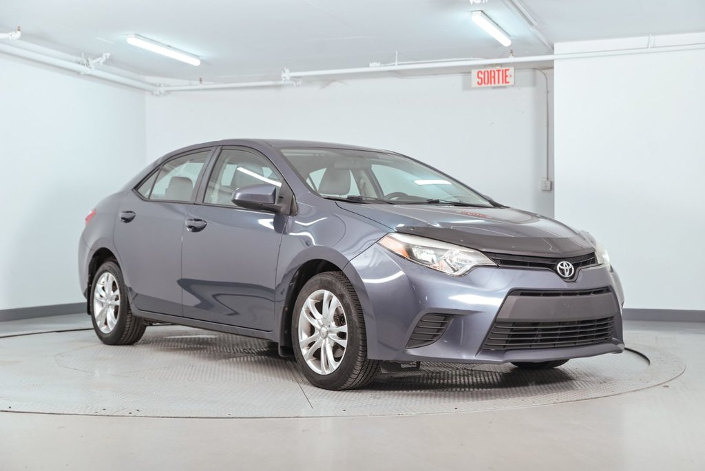 2014 Toyota Corolla LE in Brossard, Quebec - 1 - w1024h768px