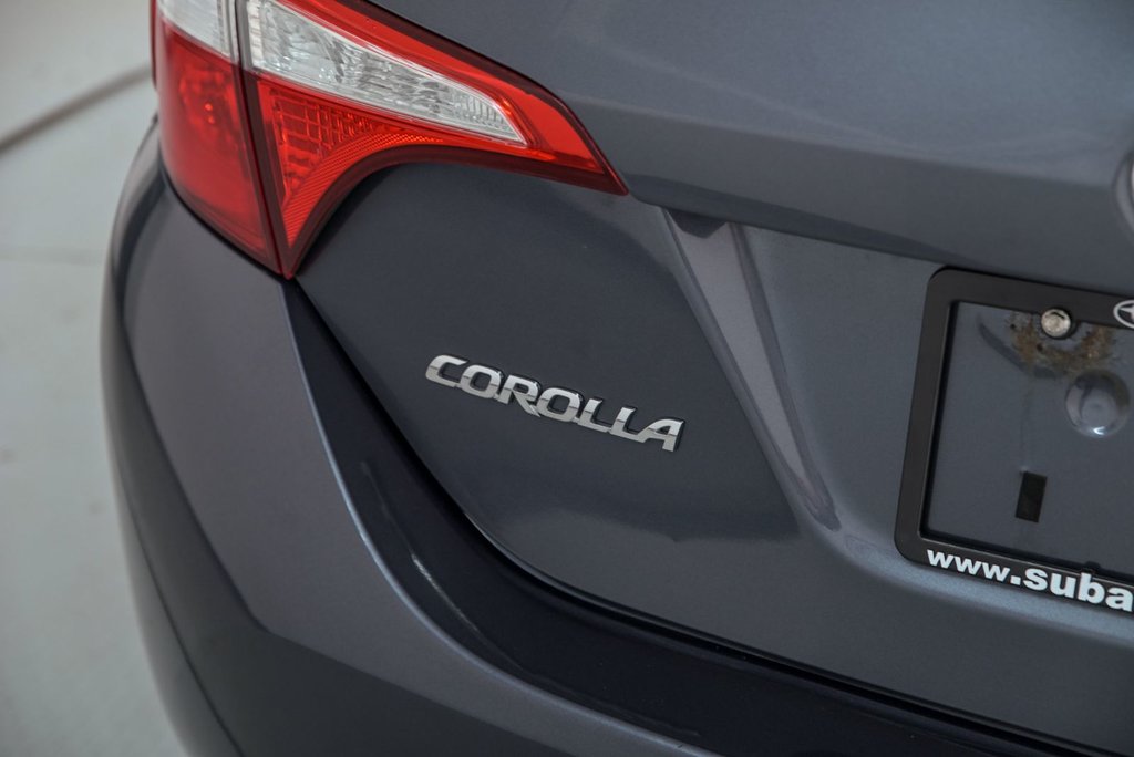 2014 Toyota Corolla LE in Brossard, Quebec - 7 - w1024h768px