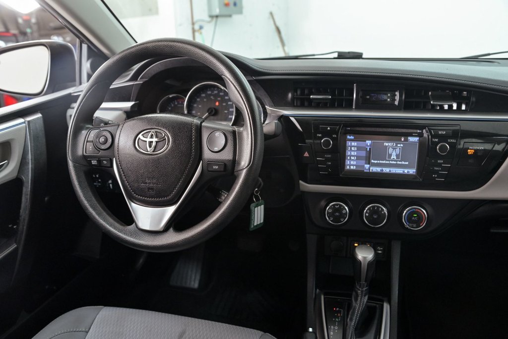 2014 Toyota Corolla LE in Brossard, Quebec - 23 - w1024h768px
