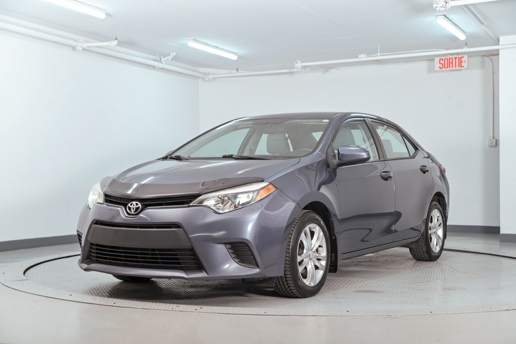 2014 Toyota Corolla LE in Brossard, Quebec - 5 - w1024h768px