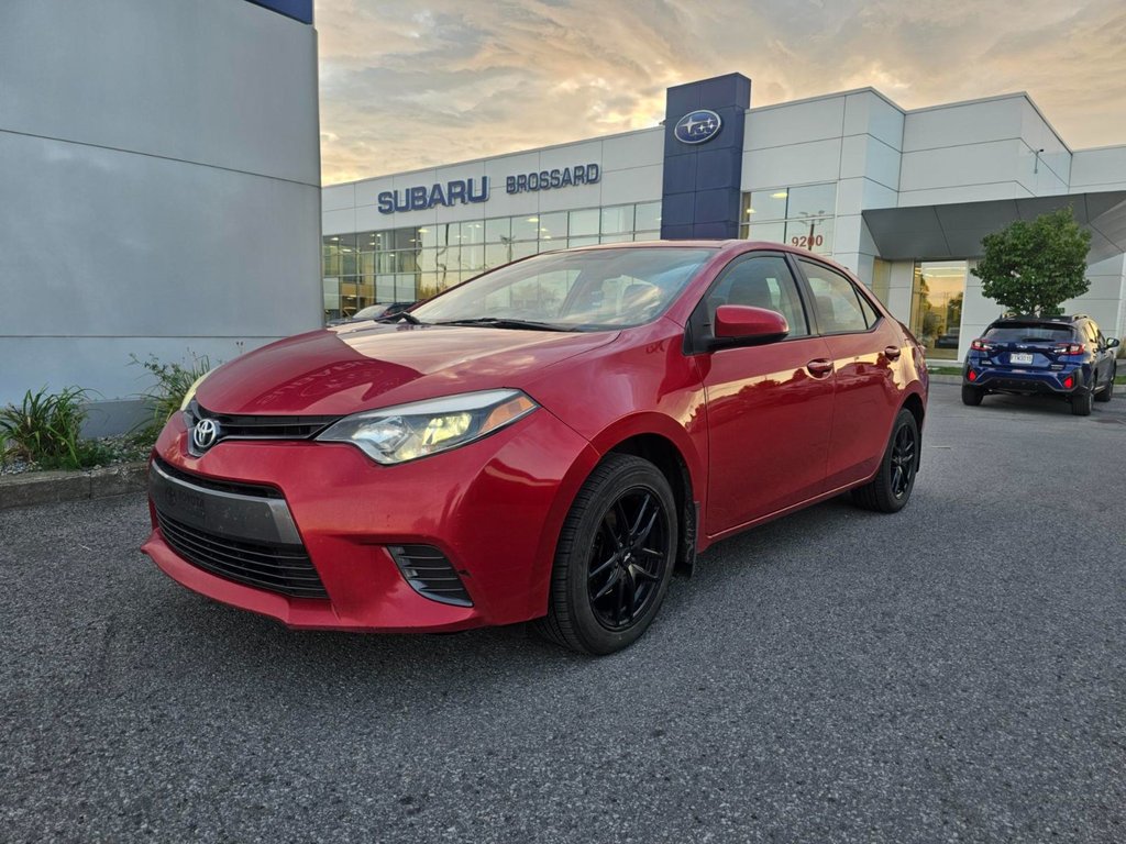 2016 Toyota Corolla LE in Brossard, Quebec - 1 - w1024h768px
