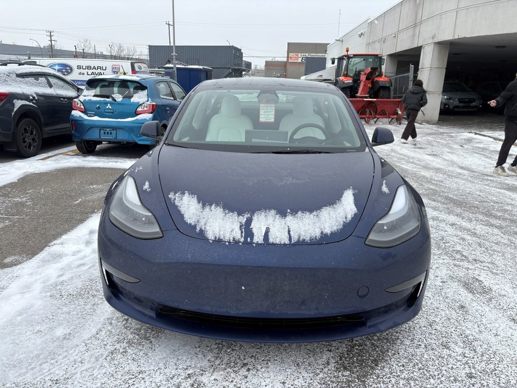 2023 Tesla Model 3 standard range plus in Laval, Quebec - 3 - w1024h768px