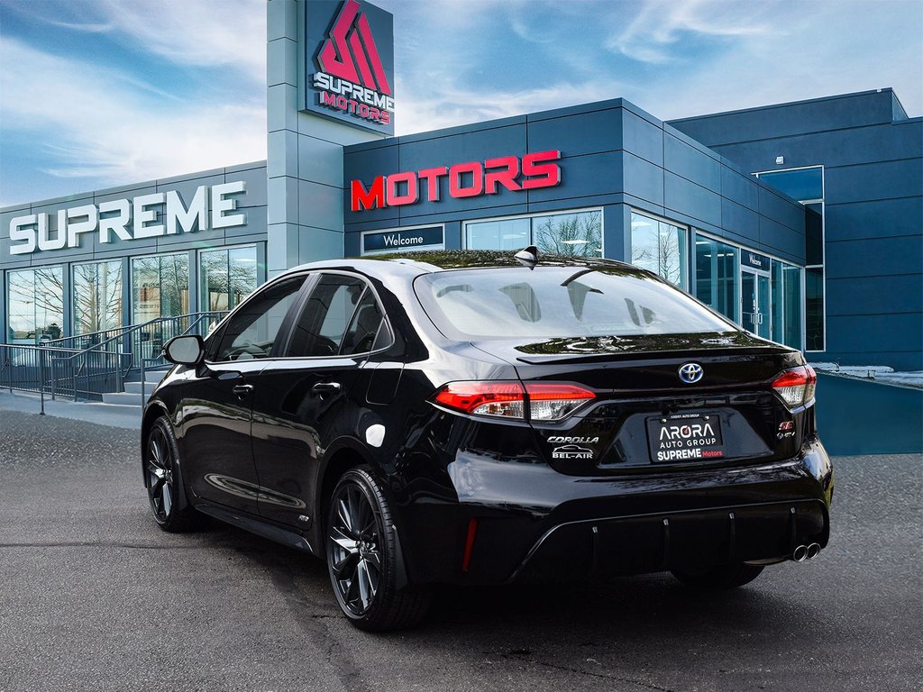 2025 Toyota COROLLA HYBRID SE AWD in Mississauga, Ontario - 4 - w1024h768px